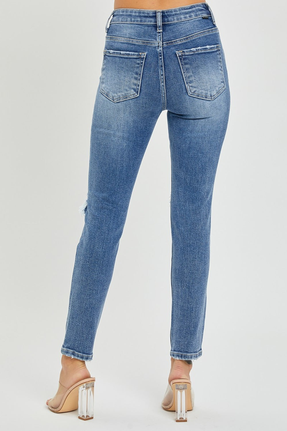 Risen Knee Distressed Skinny Jeans