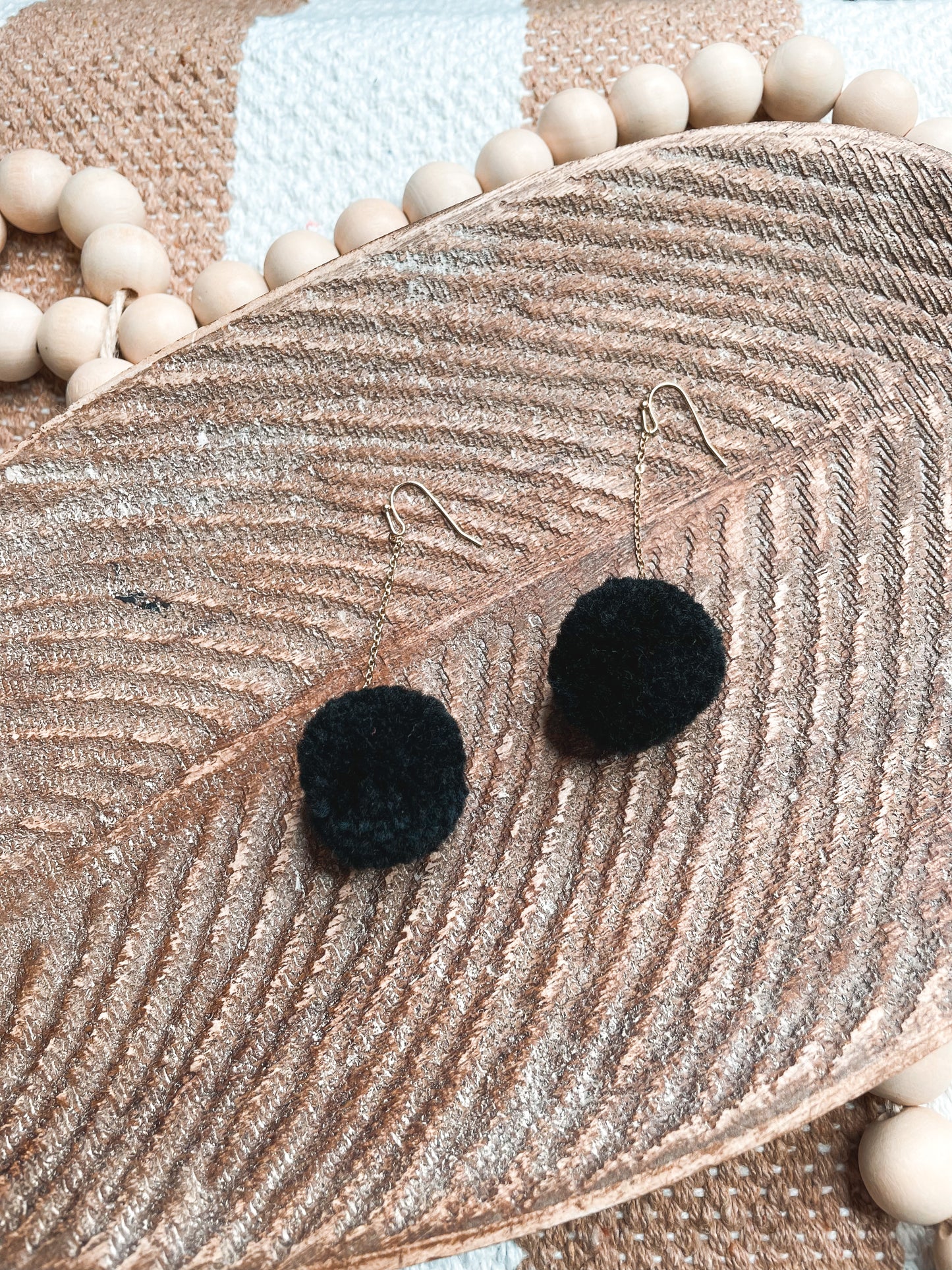 Black Pom Pom Dangle Earrings