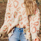 Distressed Trim Leopard Vneck Sweater